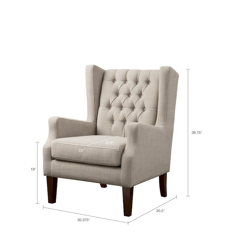 Fauteuil à dossier ailé capitonné en lin